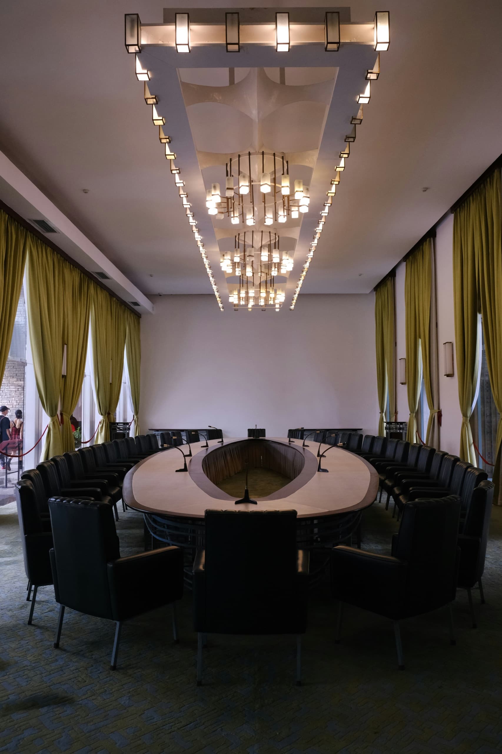 A boardroom with sculptural lighting and considered proportion