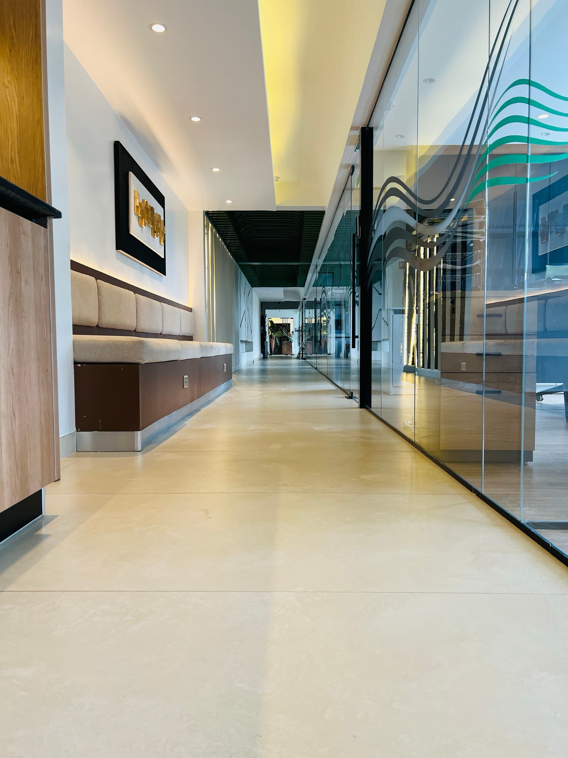Renegade Air — Command · corridor lounge with banquette seating
